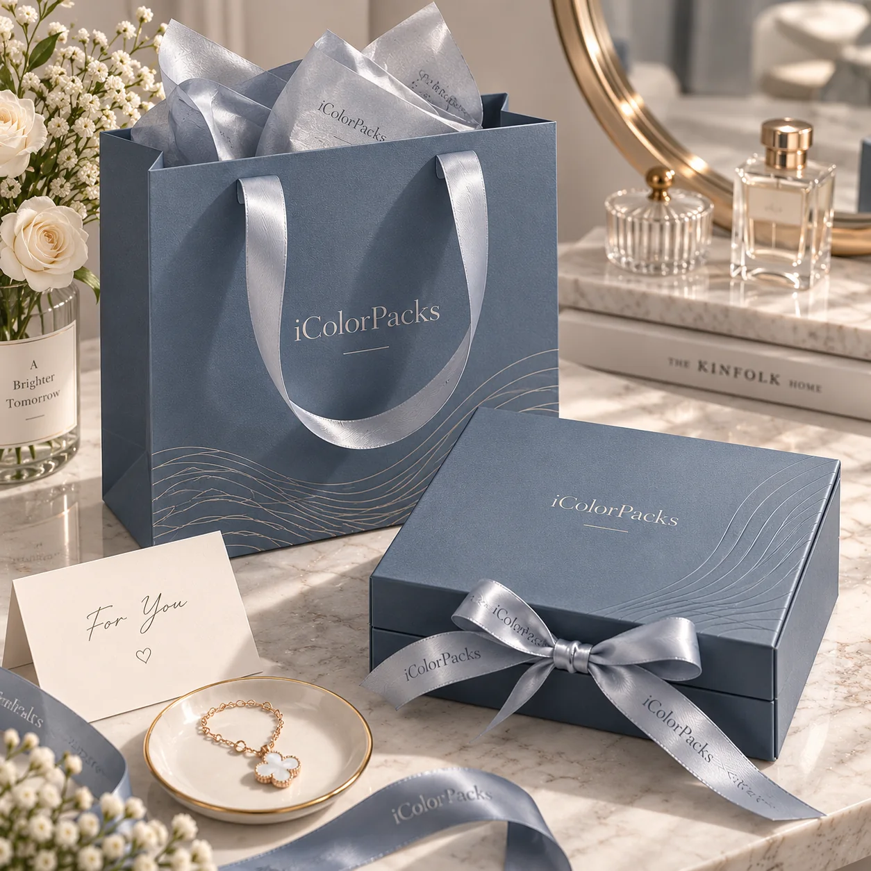Blue custom jewelry gift box with matching ribbon handle paper bag